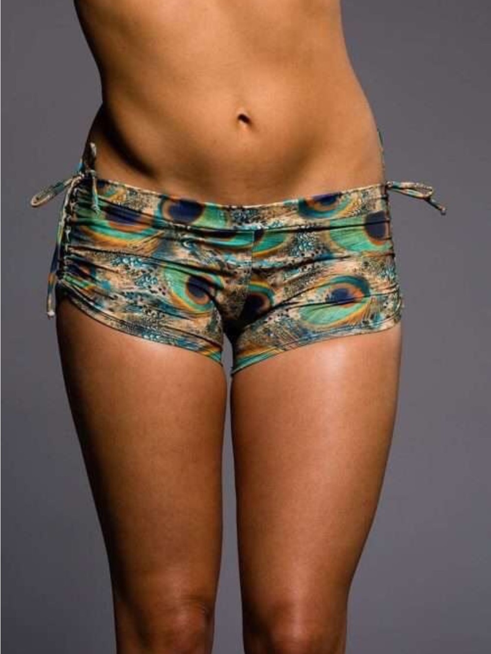 Onzie Peacock Print Side-Tie Swim Shorts in Teal and Gold O/S